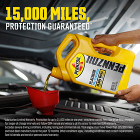Pouring Pennzoil Platinum 5W-20 into an engine to show clean application