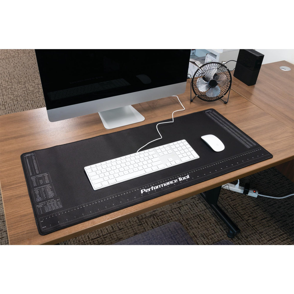 Performance Tool mat preventing spills and stains on a table for surface protection