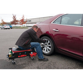 Performance Tool held in hand to show 22-inch scale, better leverage for loosening nuts