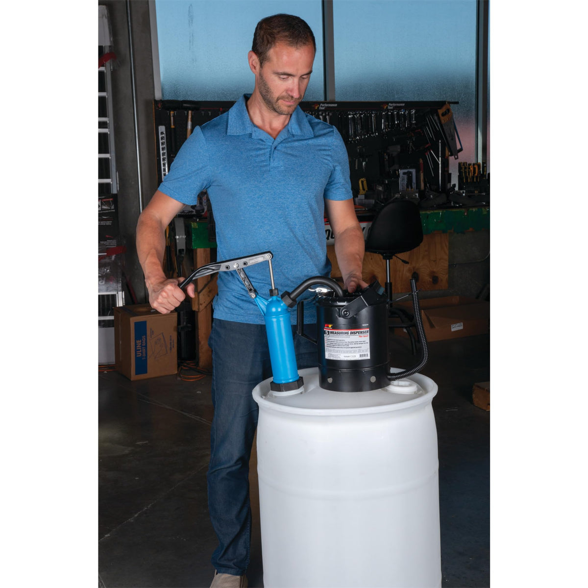 Performance Tool in use pouring fuel into jerrycan demonstrating controlled metering