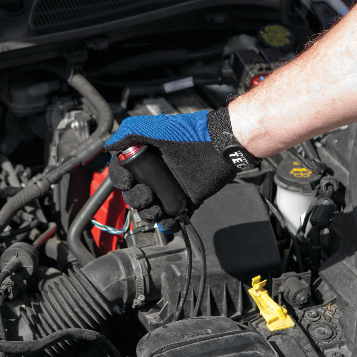 Performance Tool W80586 in use under hood enabling one-person engine cranking safely