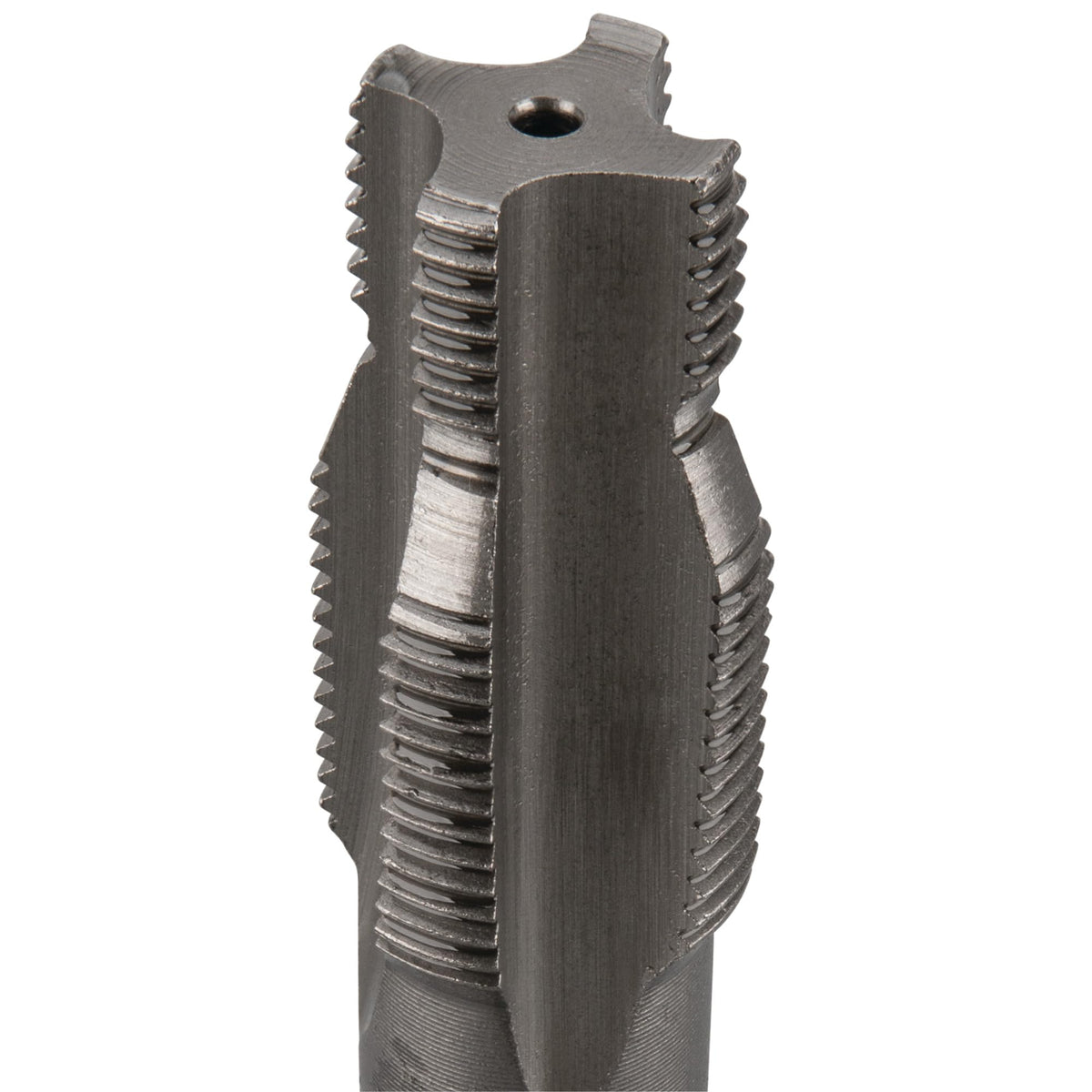 Performance Tool in-use on engine head showing how the kit restores spark plug threads for secure fitment