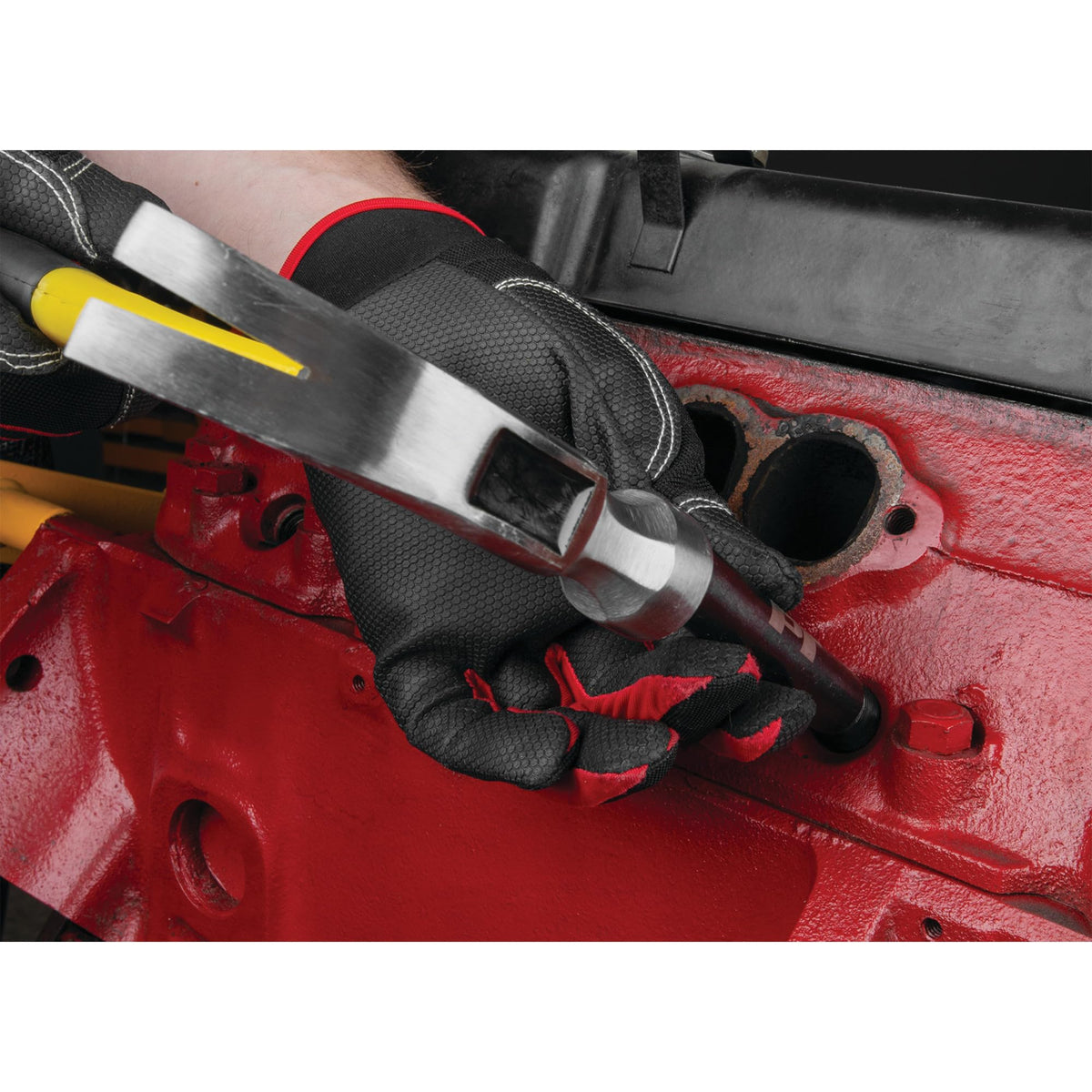 Performance Tool size comparison with a spark plug showing correct M14-1.25 fit and scale for selection