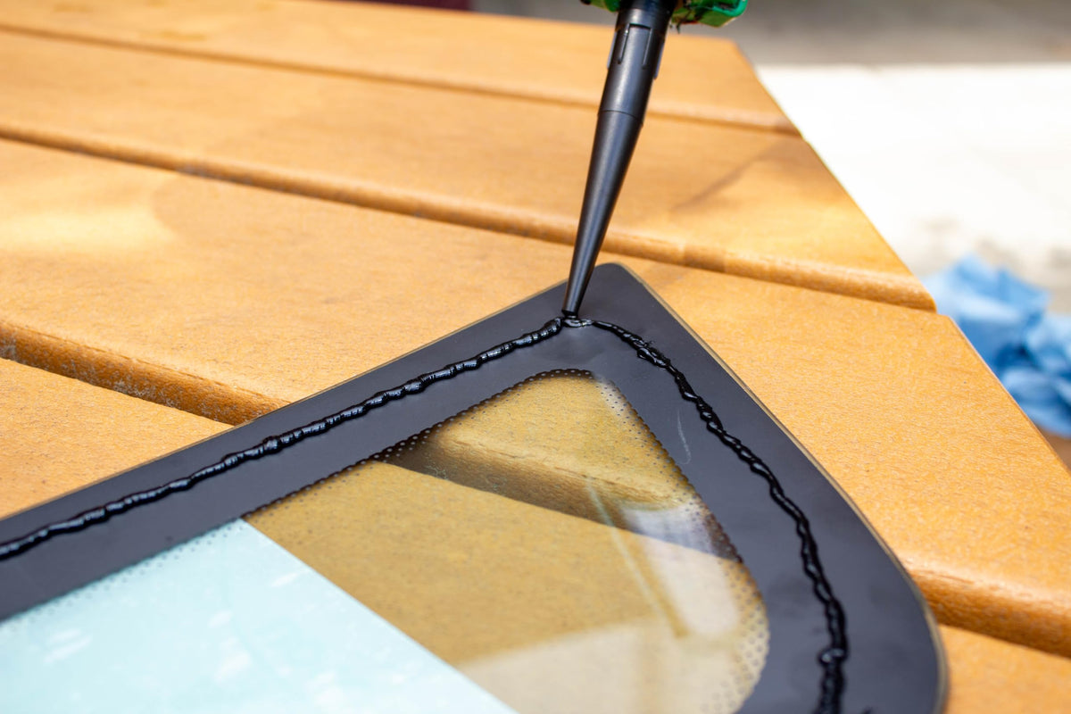 Permatex Glass Weld in use during windshield installation demonstrating fast cure and strong bond