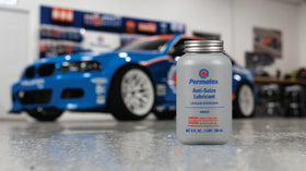 Permatex applied to spark plug threads demonstrating easier removal and corrosion prevention