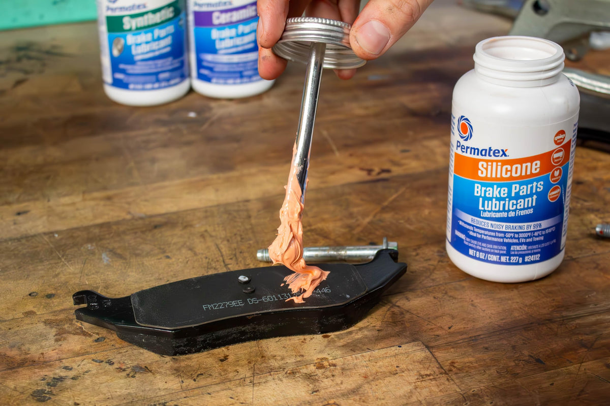 Permatex in workshop during brake service improving durability and quietness