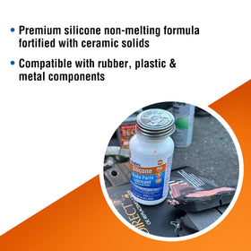 Permatex tube in hand illustrating compact size and workshop convenience