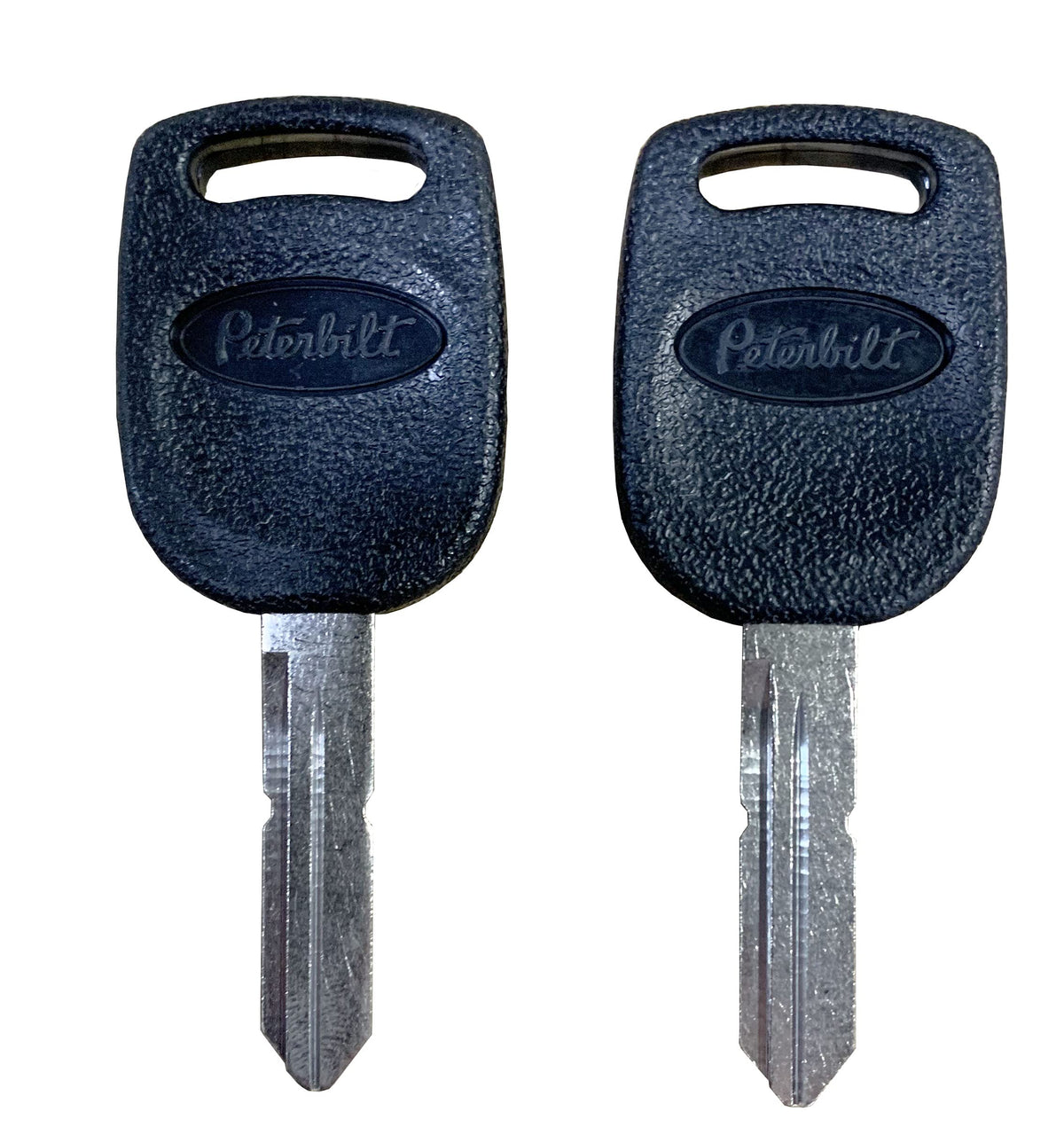 PETERBILT pair of uncut keys front view showing head and logo, authentic look
