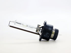 PHILIPS D2S 85122 installed in headlight assembly demonstrating balanced white illumination