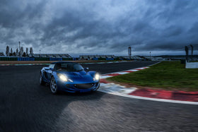 PHILIPS RacingVision GT200 installed in headlamp housing demonstrating plug-and-play fit
