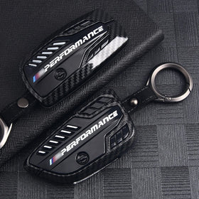 Phmnkl installed on BMW key with logo visible for brand-preserving protection