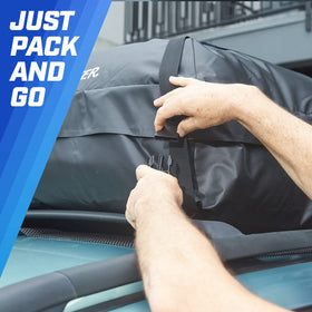 P.I. AUTO STORE loading soft suitcases into rooftop carrier to maximize space