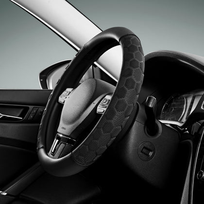 PIC AUTO front view of black football-pattern steering wheel cover, improves grip