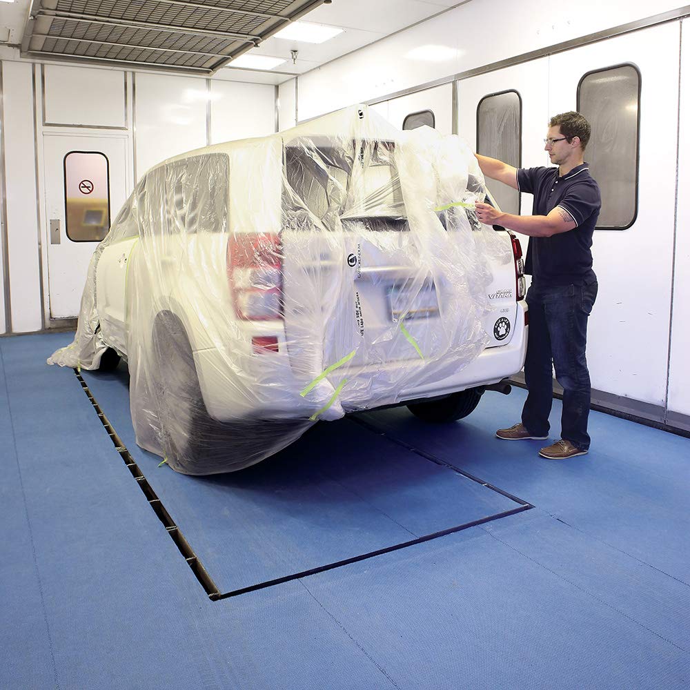 PIG grippy mat installed on booth floor demonstrating slip-free traffic protection
