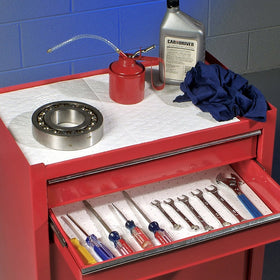 PIG oil mat absorbing oil-based liquid demonstrating fast uptake benefit