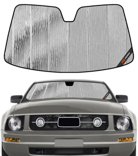 Pigenius AstraGuard front view fitted to Mustang windshield, blocking sunlight