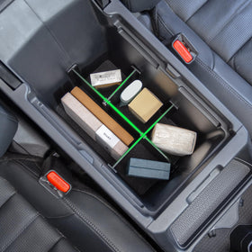 PIMCAR hidden storage box open in armrest keeping valuables private and secure