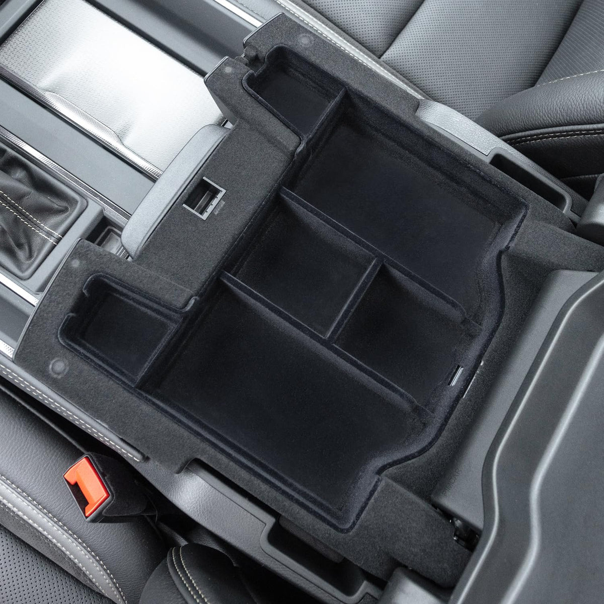 PIMCAR in use holding phone, eyewear and keys for tidy storage