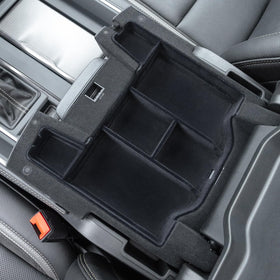 PIMCAR in use holding phone, eyewear and keys for tidy storage