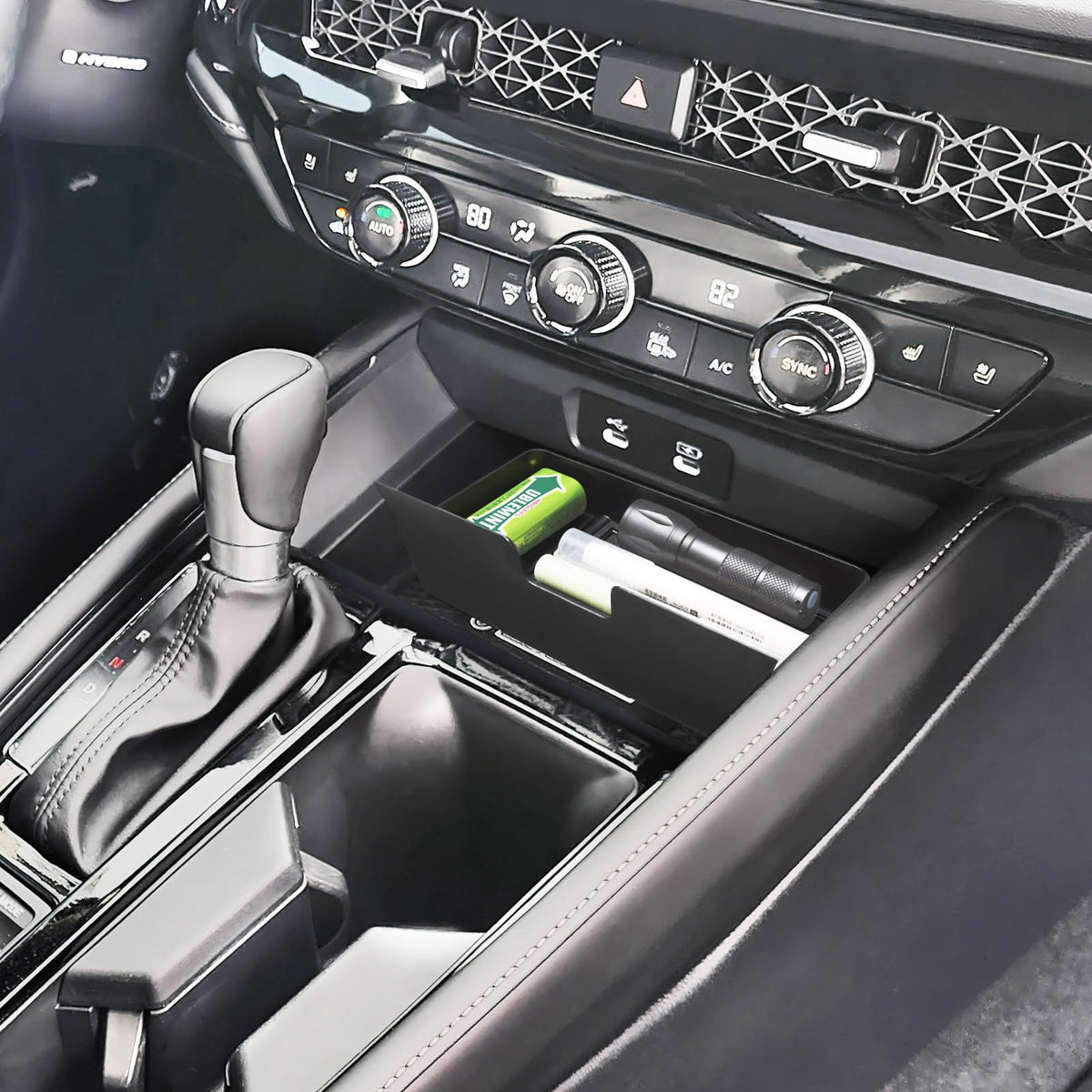 PIMCAR lifestyle shot of car interior showing tidy organized storage