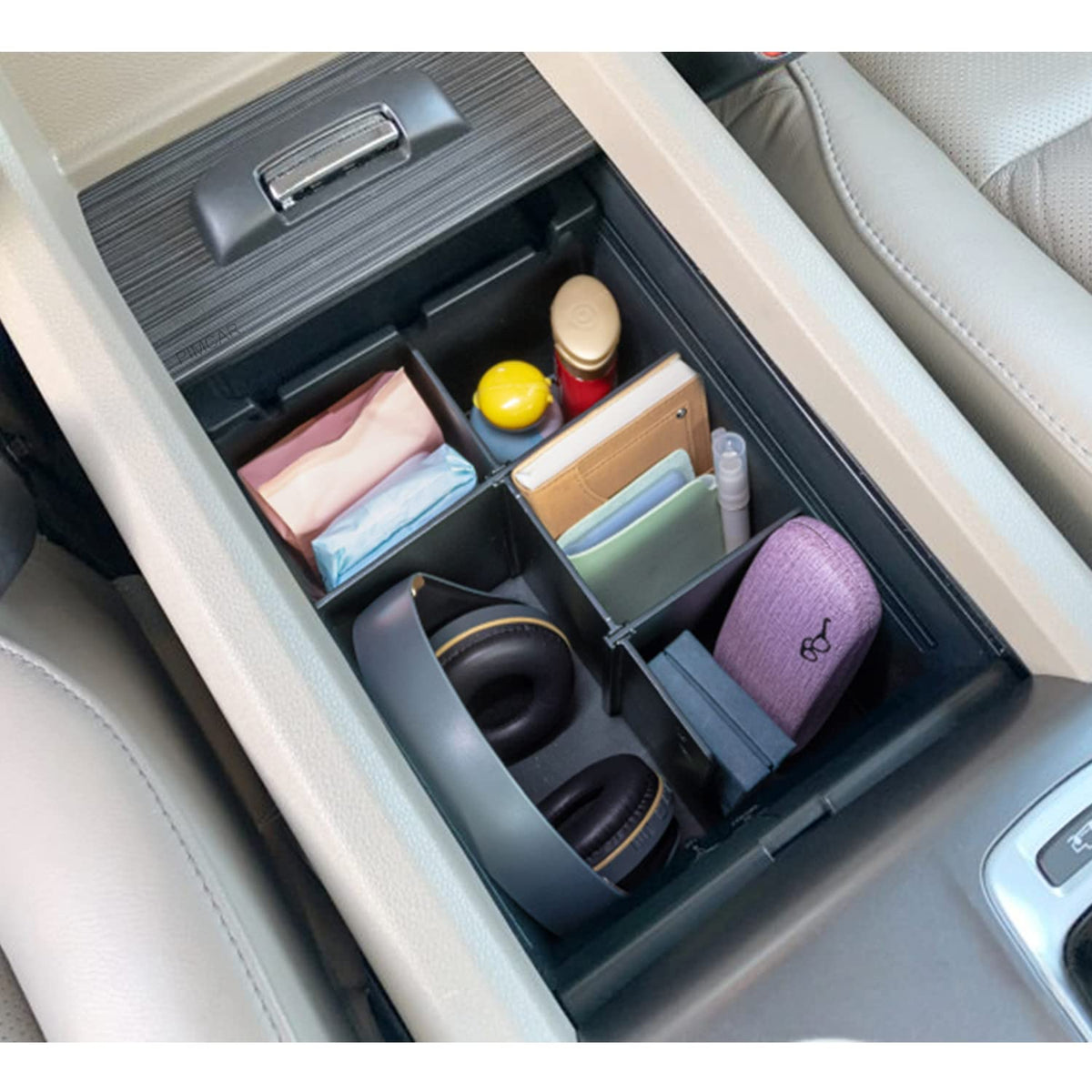 PIMCAR organizer holding phones and keys for easy access and tidy storage