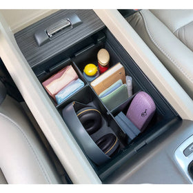 PIMCAR organizer holding phones and keys for easy access and tidy storage