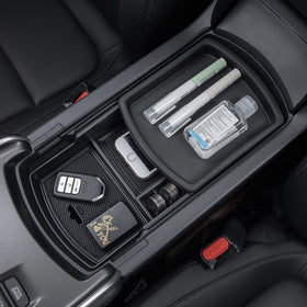 PIMCAR organizer with charging cable routed through back hole for tidy charging