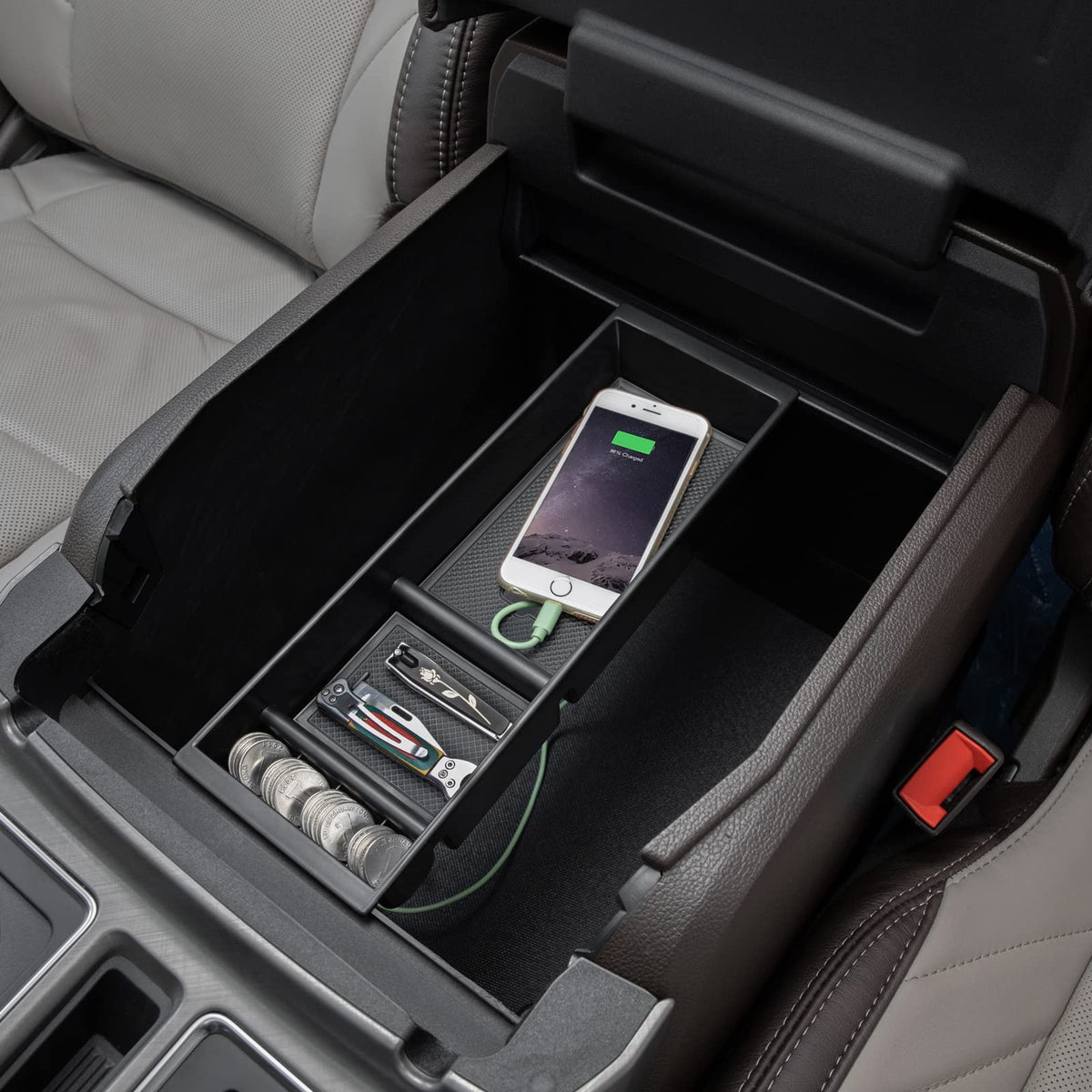 PIMCAR tray being placed into console demonstrating tool-free install