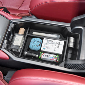 PIMCAR organizer next to phone and wallet demonstrating size fit