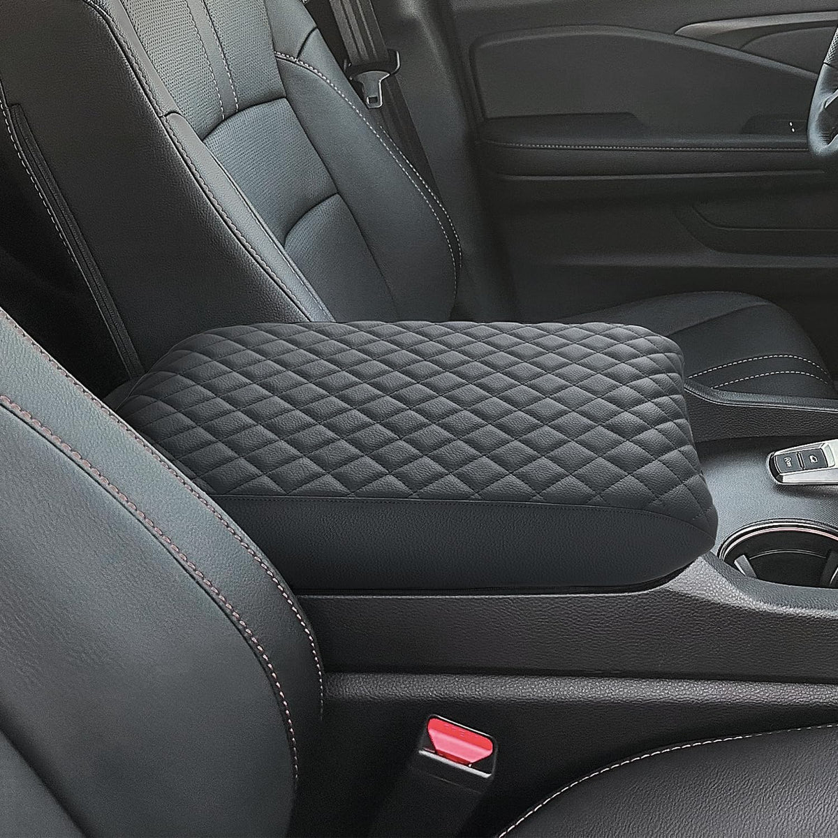 PIMCAR armrest next to hand for scale showing comfortable padded support