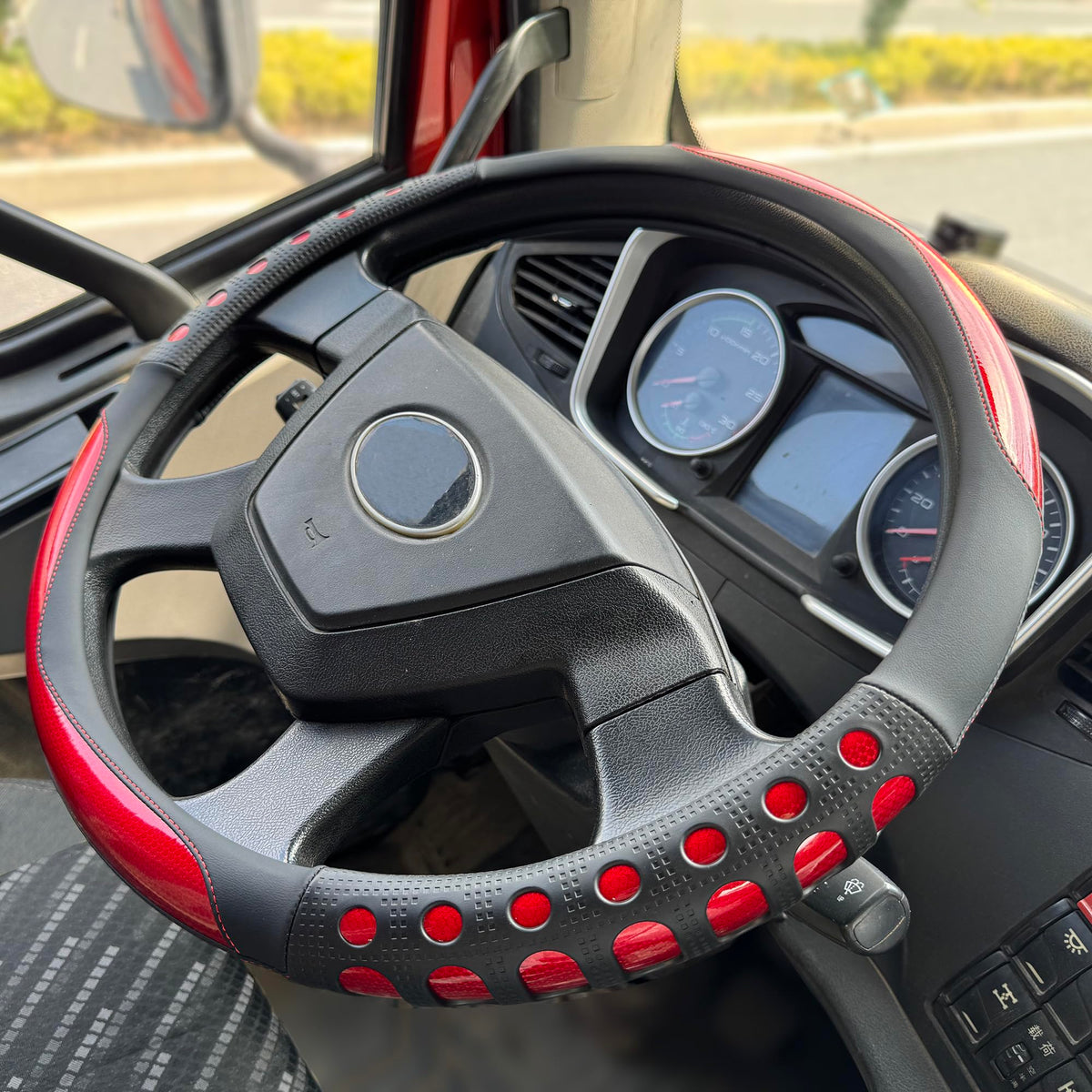 PINCTROT front view of racing red cover showing fit and style, improves steering control