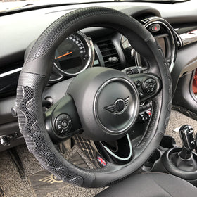 PINCTROT front view of all-black steering wheel cover showing sleek fit and style