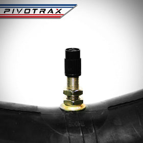 PIVOTRAX rider changing tire on trail showing fast field repair benefit