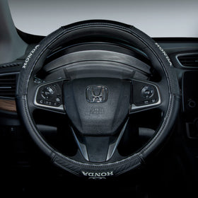 Plasticolor embossed Honda logo detail providing official branding and premium appearance