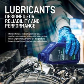 Polaris DOT 4 bottle placed in an engine bay near brake components to illustrate compatibility