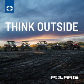 After-service RZR on trail with rider highlighting Polaris kit keeps vehicle ready to ride