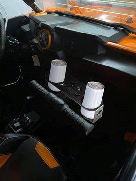 Generic lifestyle shot on Polaris RZR showing accessible passenger beverage