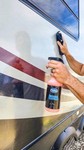 Poli Glow being applied to a boat hull for marine protection