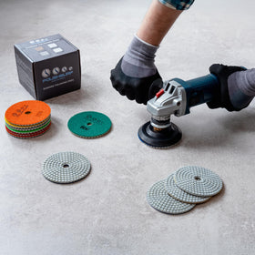 POLISHSURF pad polishing marble countertop wet, demonstrating reduced dust and shine