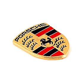 Porsche lifestyle desk scene with key crest restored for authentic branded look