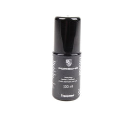 Porsche leather conditioner front bottle showing label and compact size for easy storage