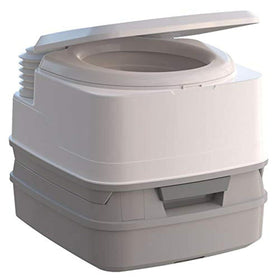 Porta Potti next to a water bottle showing size and portability benefits
