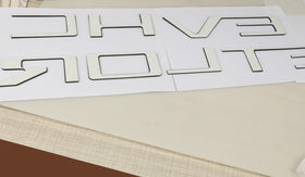 POSPICE adhesive backing detail showing full-coverage tape for secure bond