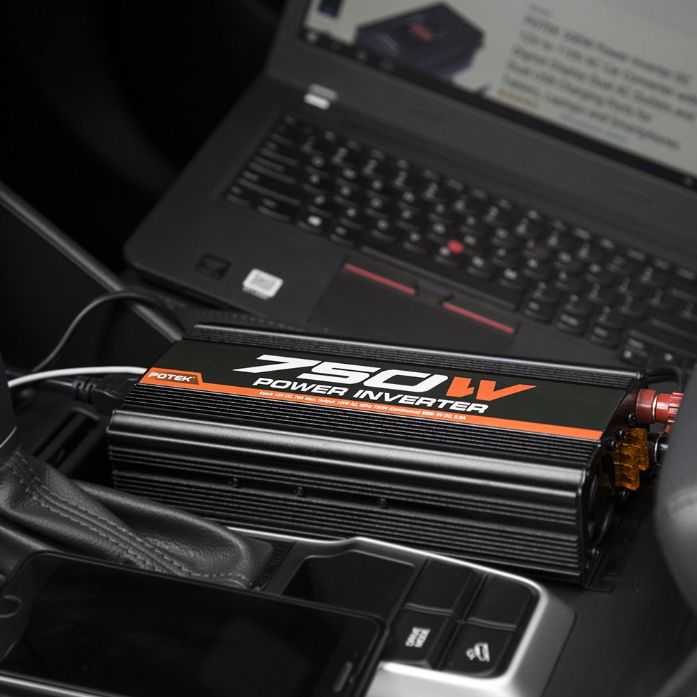POTEK next to laptop to show compact size and useful travel benefit