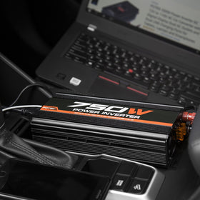 POTEK next to laptop to show compact size and useful travel benefit