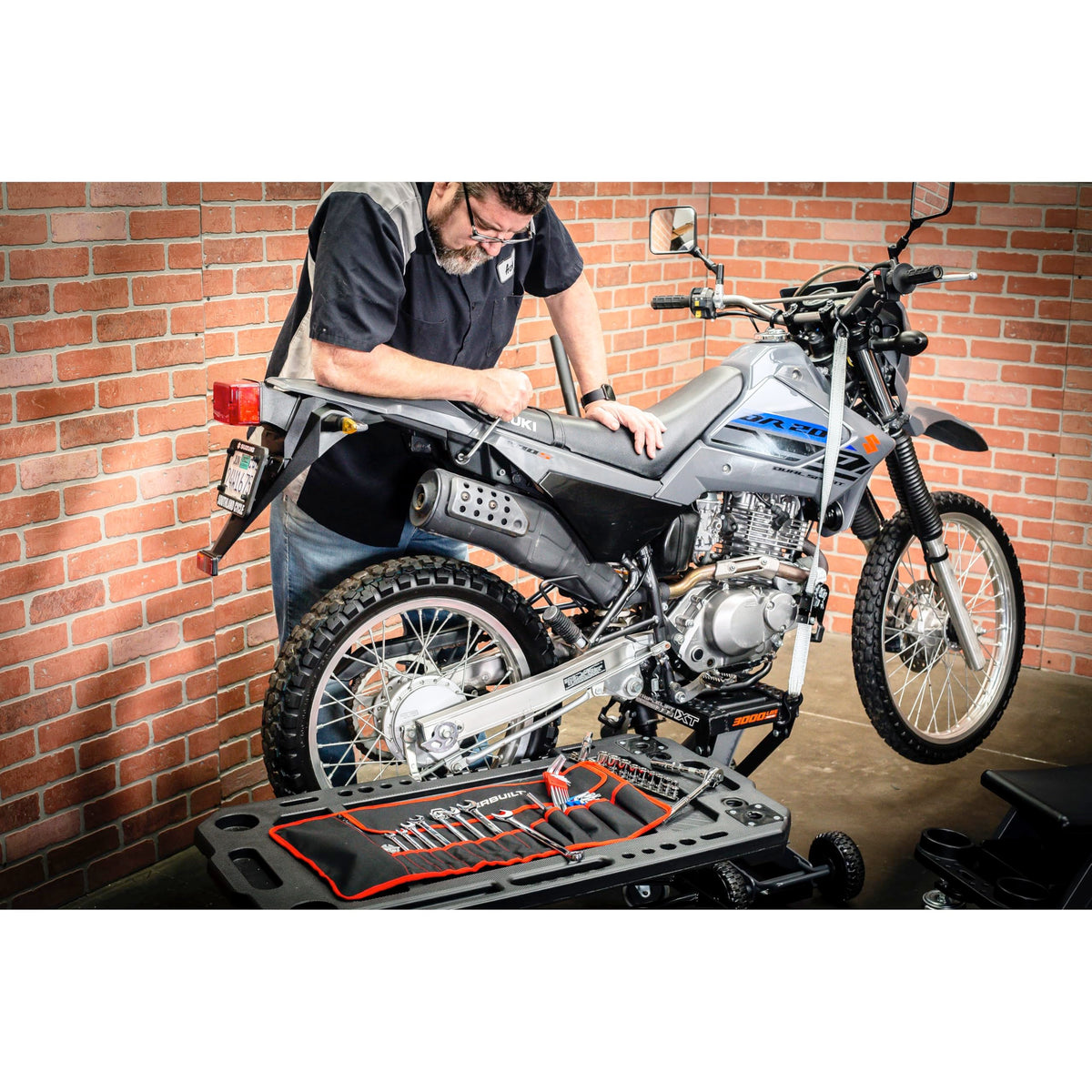 Powerbuilt long-pattern combination wrench set laid out for common motorcycle bolts