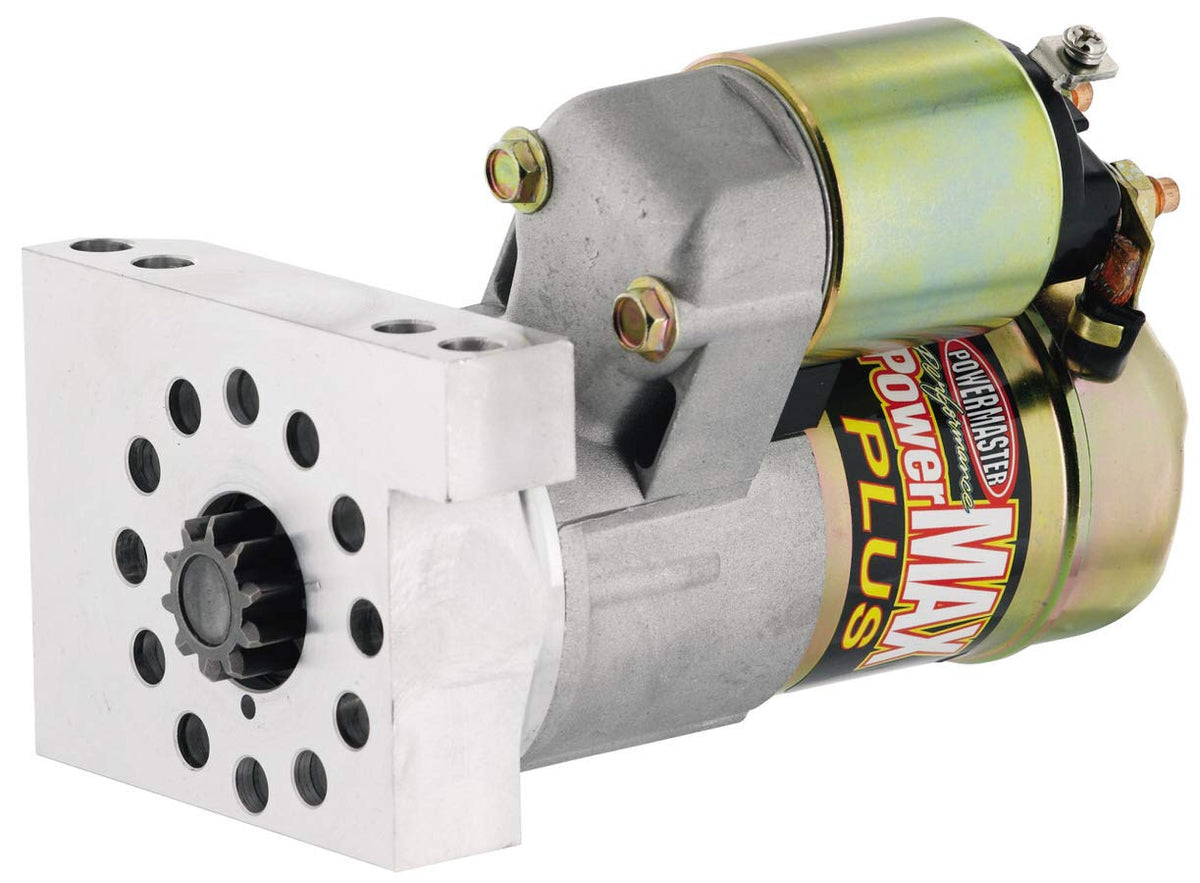 Powermaster starter front view showing mounting flange and pinion for reliable Chevy V8 starts