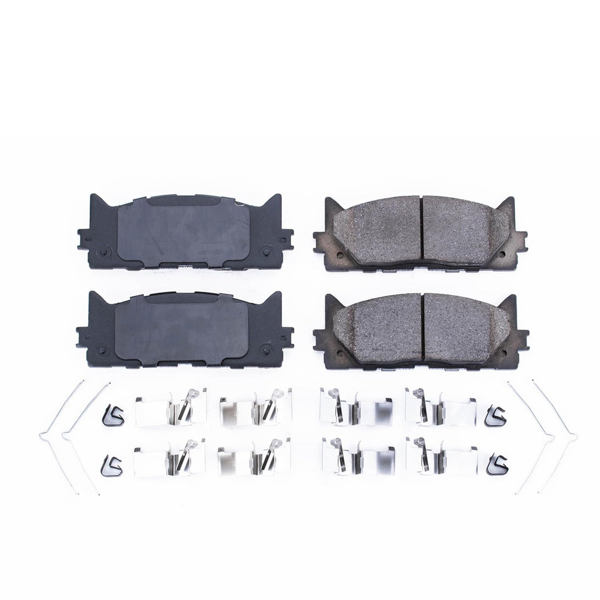PowerStop pad face close-up revealing chamfers and slots for quieter braking