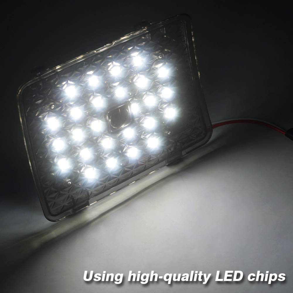 Powerty cargo light next to a hand showing compact size and easy installation