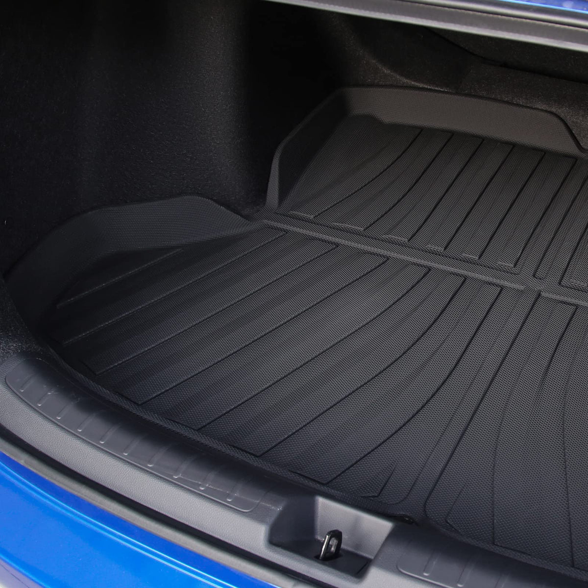 powoq trunk mat liquid spill test showing easy wipe-clean benefit